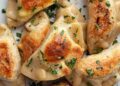 Sauerkraut Pierogi Recipe Serving by pan frying